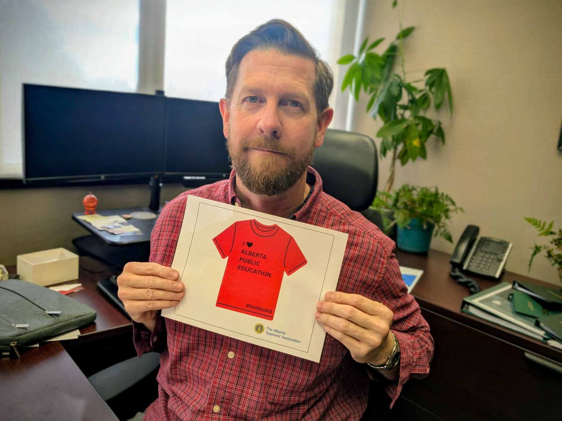 MLA Kyle Kasawski shows his support for public education.